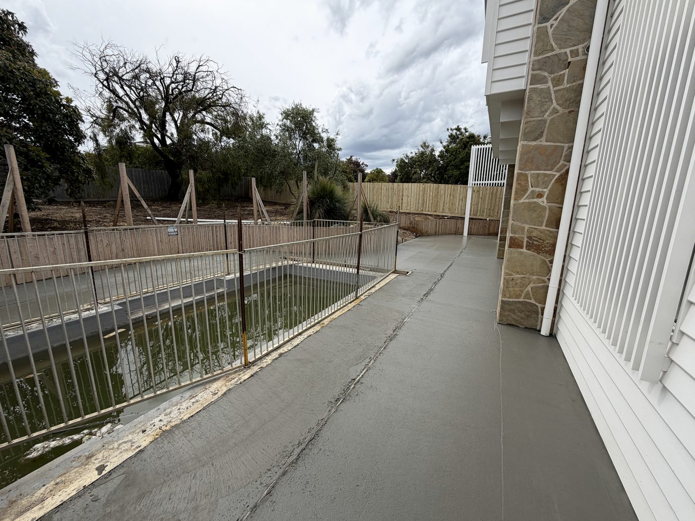 Curved concrete pool surround on Fischer Street, Torquay