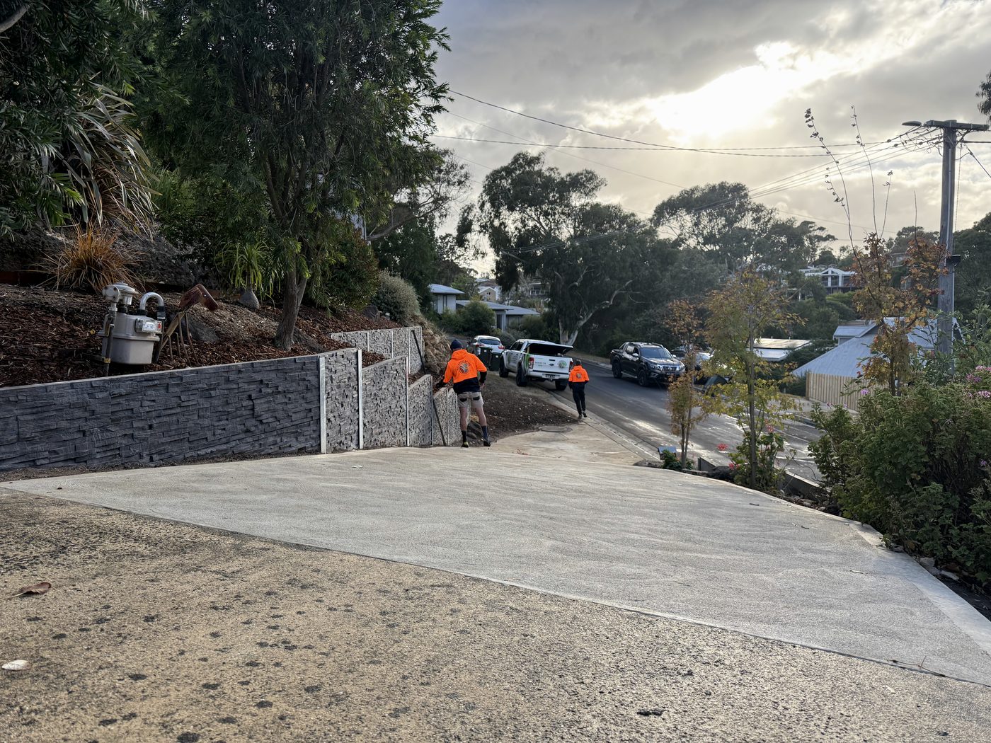 Finished Ocean Grove concrete sleeper retaining wall — driveway level